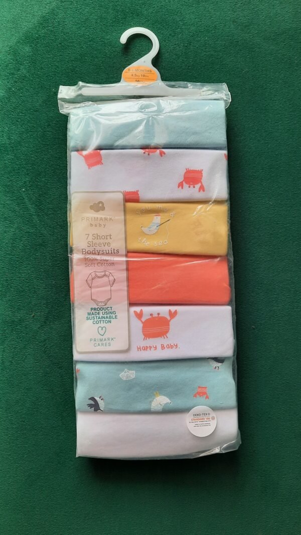 Primark 7 short sleeve cotton bodysuits (0-1M)